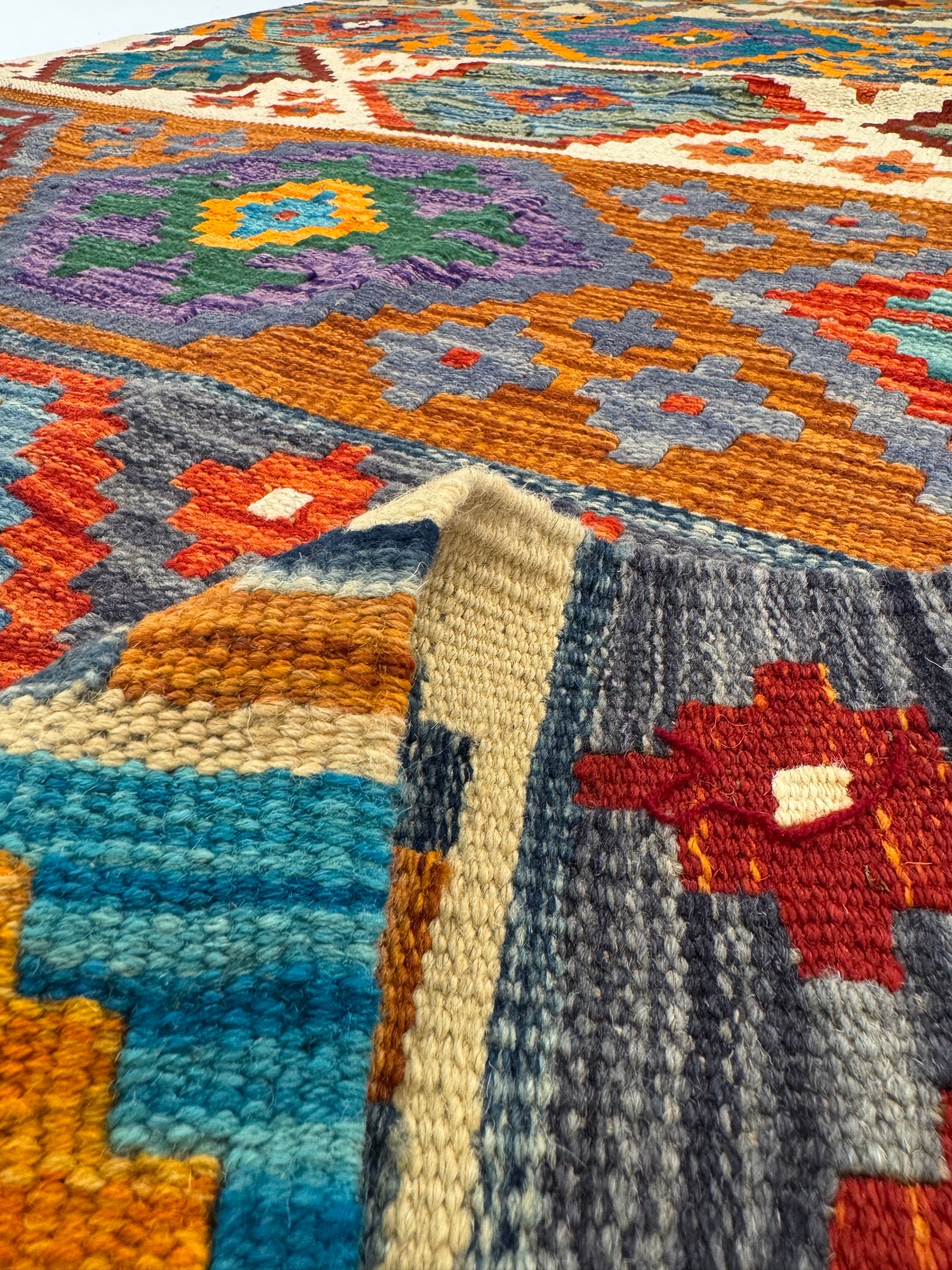 Nomad Glow El Dokuma Kilim – Turuncu Zeminli Çok Renkli Elmas Desenli Otantik Kilim (1.28 x 2.02 m) | NG-0030