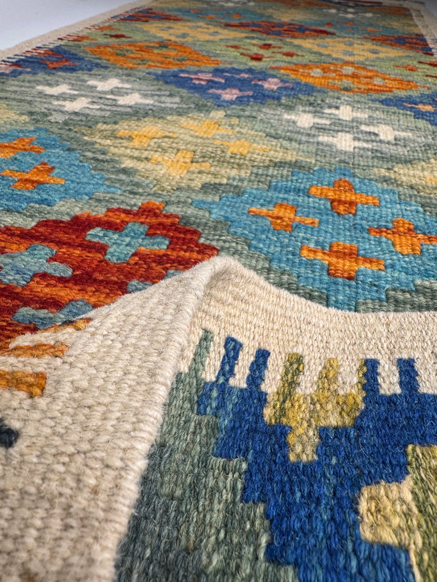 El Dokuma Uzun Kilim – Mavi Turuncu Sarı Geometrik Desenli Otantik Dekoratif Halı (0.53 x 1.40 m) | Nomad Glow Serisi NG-0016