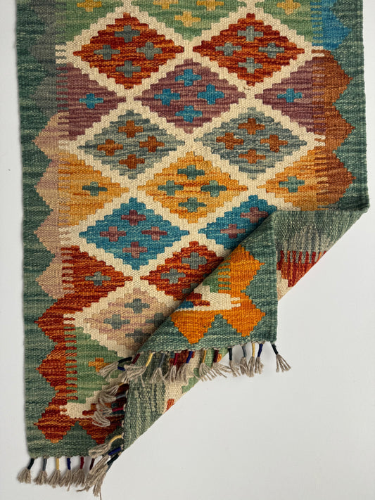 El Dokuma Uzun Kilim – Krem Turuncu Mavi Çok Renkli Geometrik Desenli Otantik Halı (0.49 x 1.41 m) | Nomad Glow Serisi NG-0015