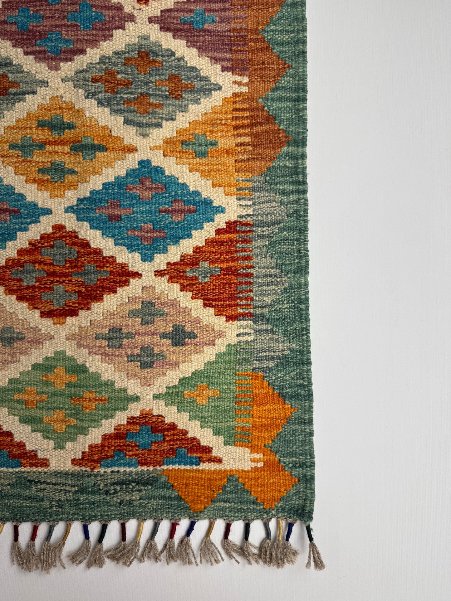 El Dokuma Uzun Kilim – Krem Turuncu Mavi Çok Renkli Geometrik Desenli Otantik Halı (0.49 x 1.41 m) | Nomad Glow Serisi NG-0015