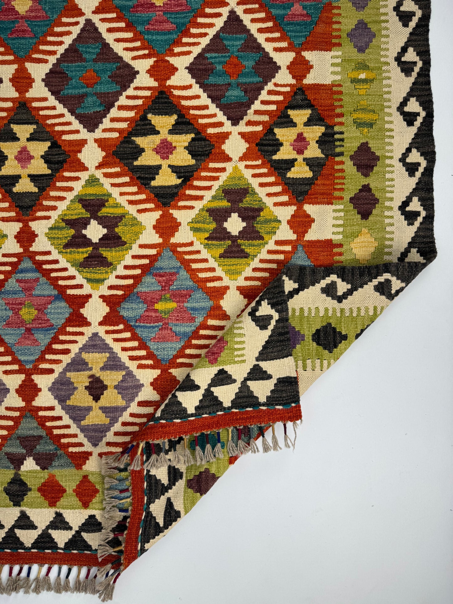 Nomad Glow El Dokuma Kilim – Sarı Zeminli Kırmızı ve Mavi Elmas Desenli Otantik Kilim (1.22 x 1.80 m) | NG-0031