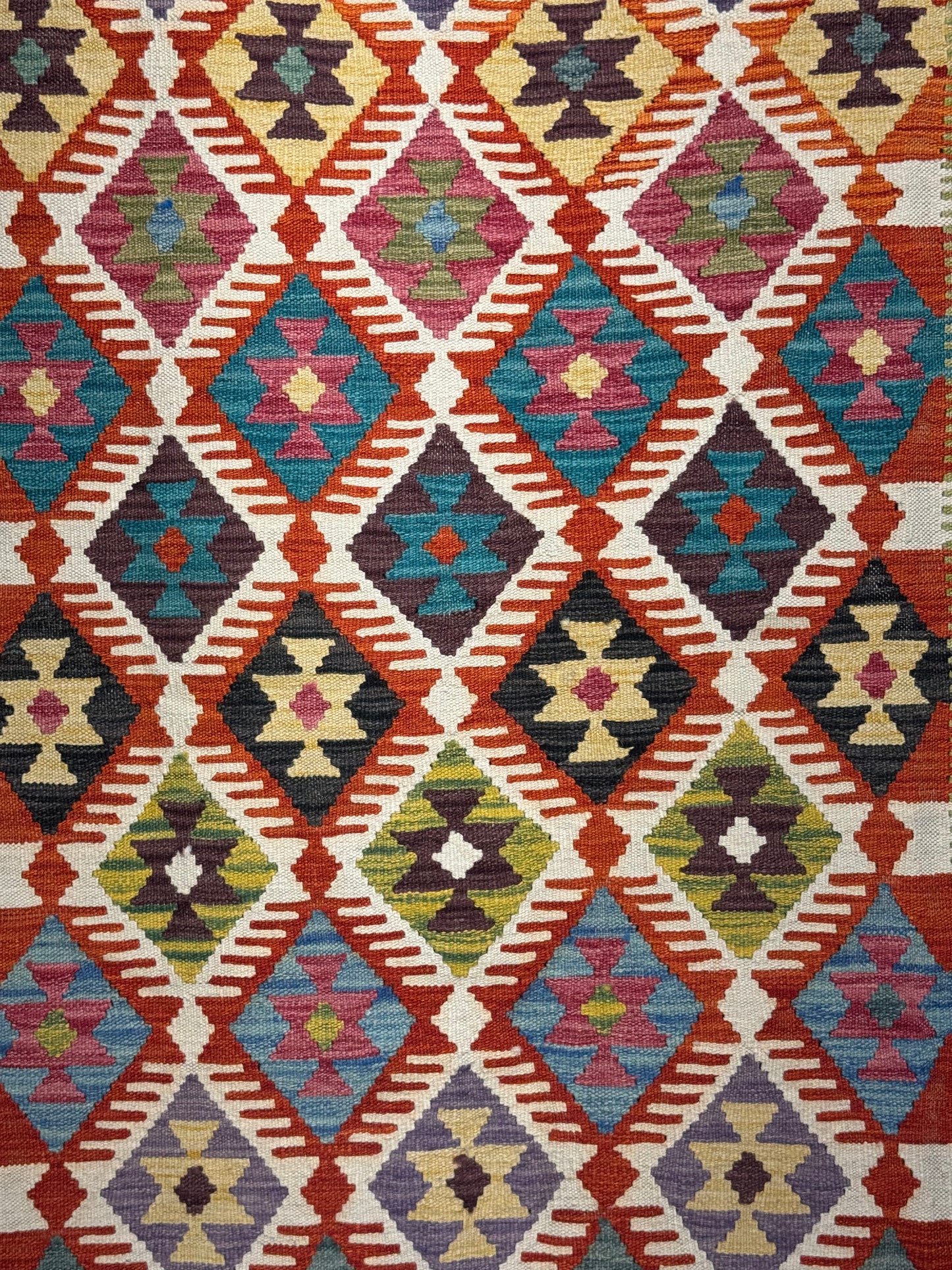 Nomad Glow El Dokuma Kilim – Sarı Zeminli Kırmızı ve Mavi Elmas Desenli Otantik Kilim (1.22 x 1.80 m) | NG-0031