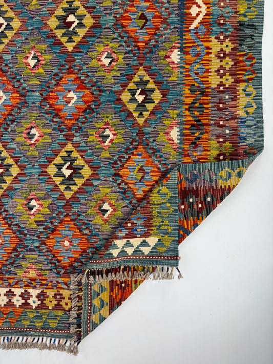 Nomad Glow El Dokuma Kilim – Geniş Ölçekli Geometrik Desenli Renkli Otantik Kilim (1.74 x 2.49 m) | NG-0035