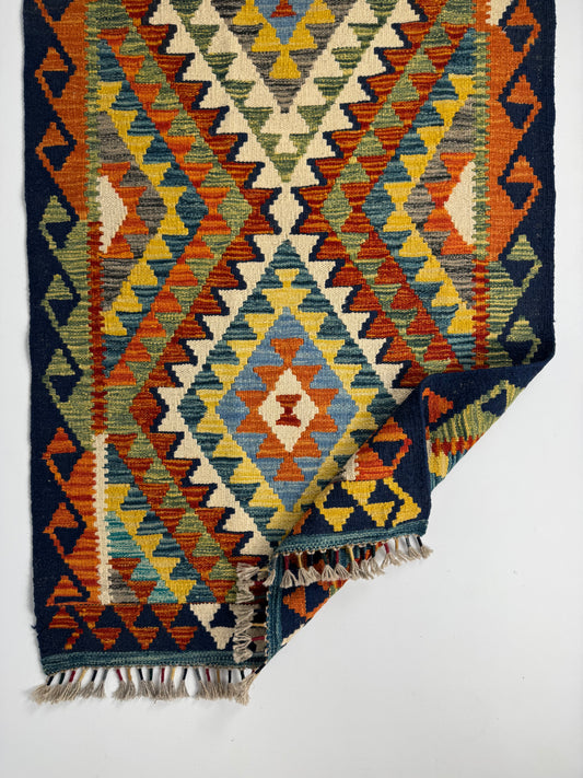Nomad Glow El Dokuma Kilim – Canlı Renkli Geometrik ve Etnik Desenli Otantik Kilim (0.80 x 2.59 m) | NG-0028