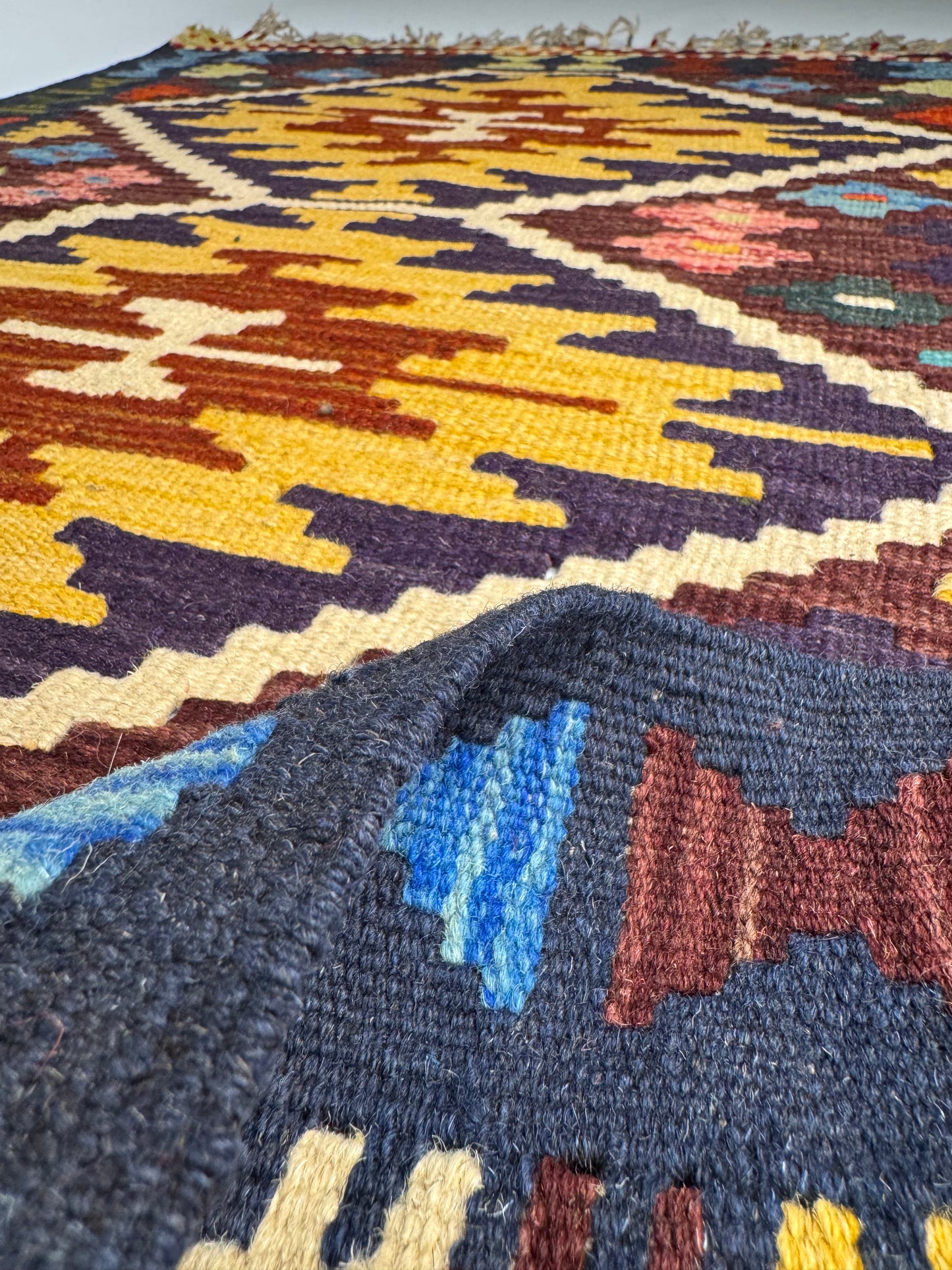 Nomad Glow El Dokuma Kilim – Sarı Kırmızı Lacivert Geometrik Desenli Otantik Kilim (0.78 x 1.22 m) | NG-0018