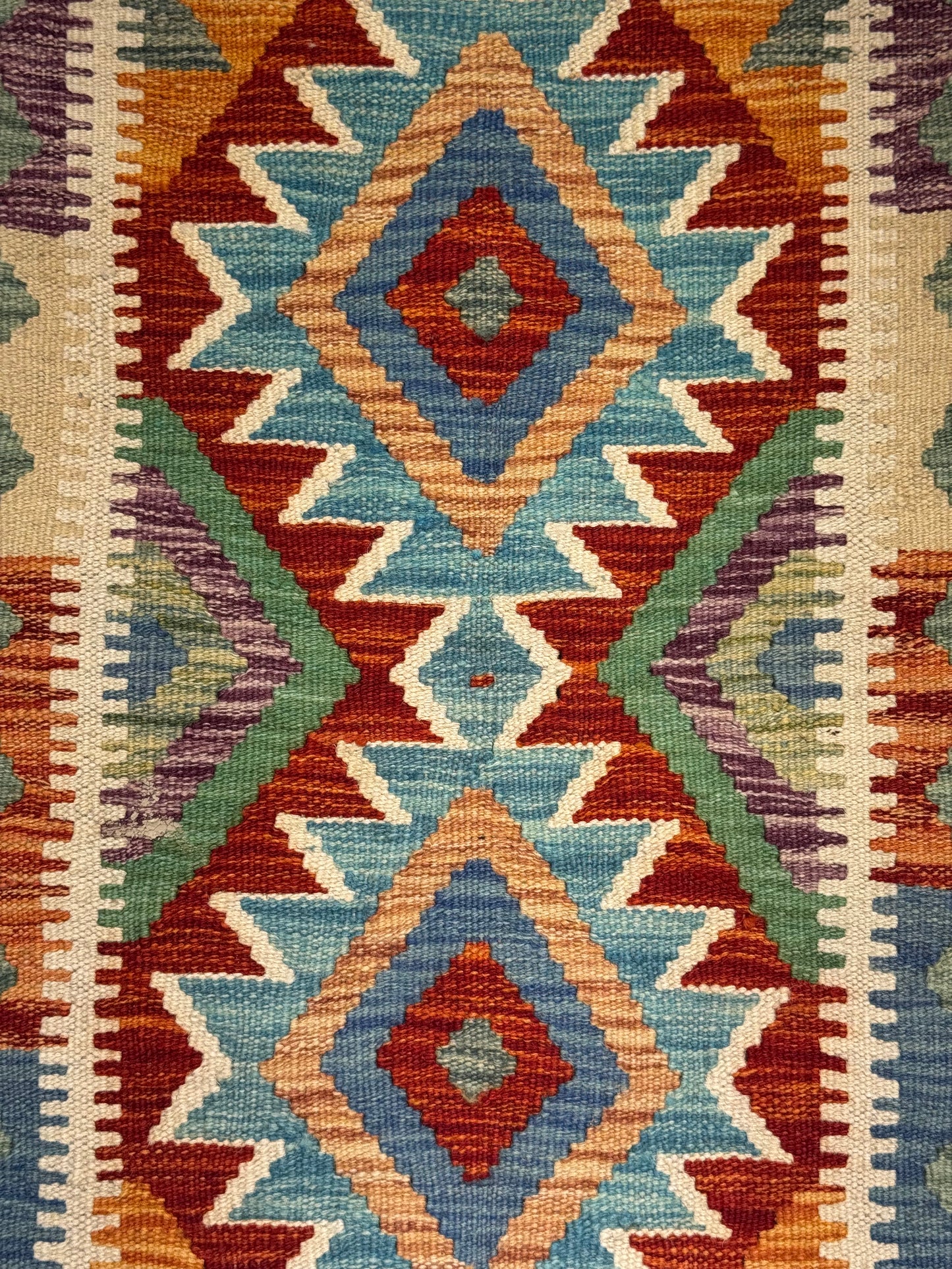 El Dokuma Çok Renkli Küçük Kilim – Kırmızı Turuncu Mavi Geometrik Desenli Otantik Halı (0.57 x 0.91 m) | Nomad Glow Serisi NG-0012