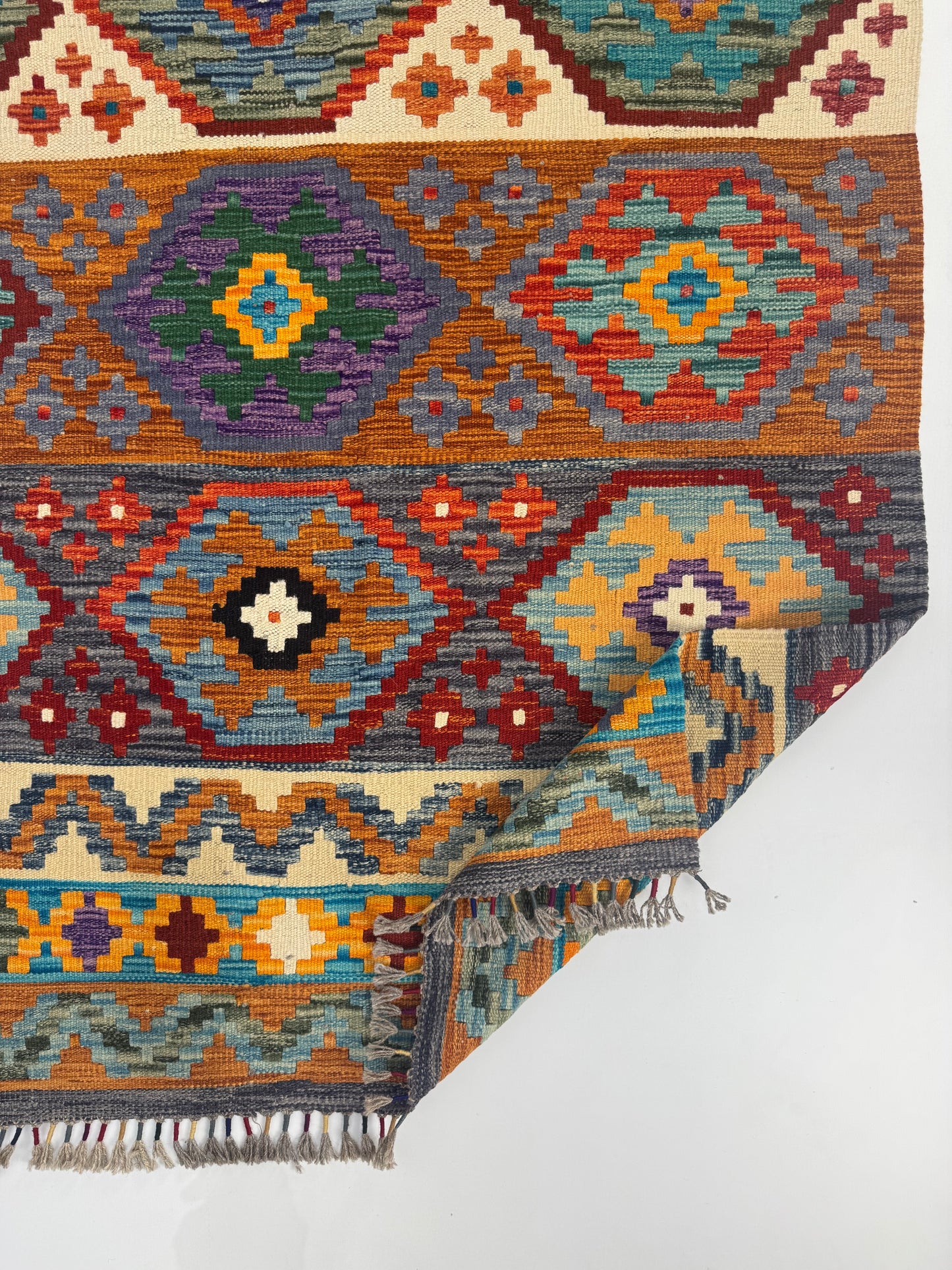 Nomad Glow El Dokuma Kilim – Turuncu Zeminli Çok Renkli Elmas Desenli Otantik Kilim (1.28 x 2.02 m) | NG-0030