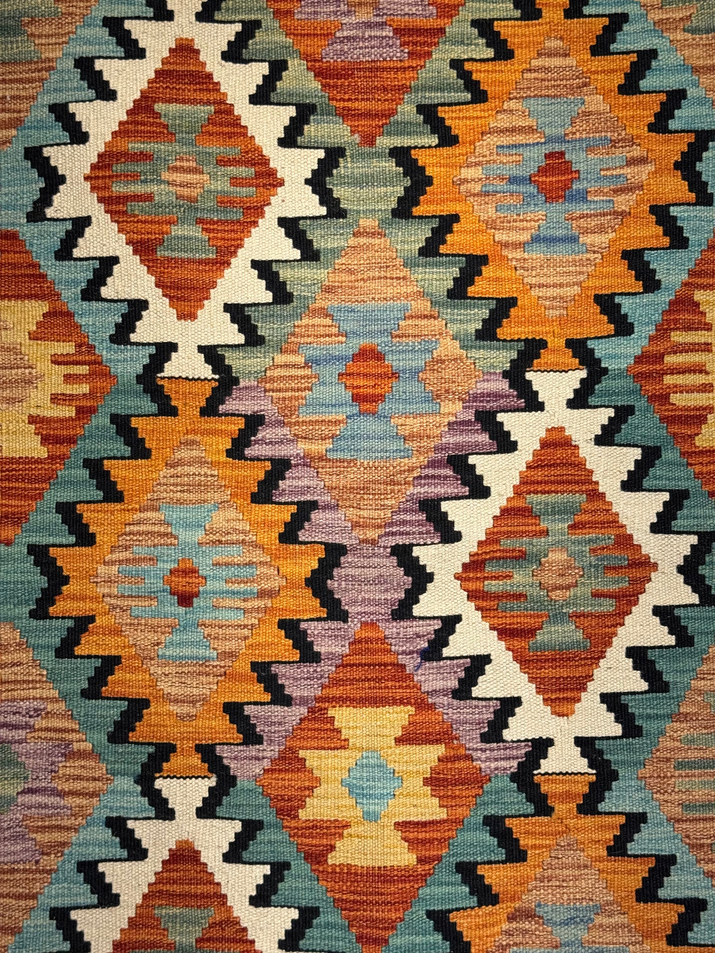 Nomad Glow El Dokuma Kilim – Turuncu ve Mavi Geometrik Desenli Otantik Kilim (0.79 x 1.27 m) | NG-0022