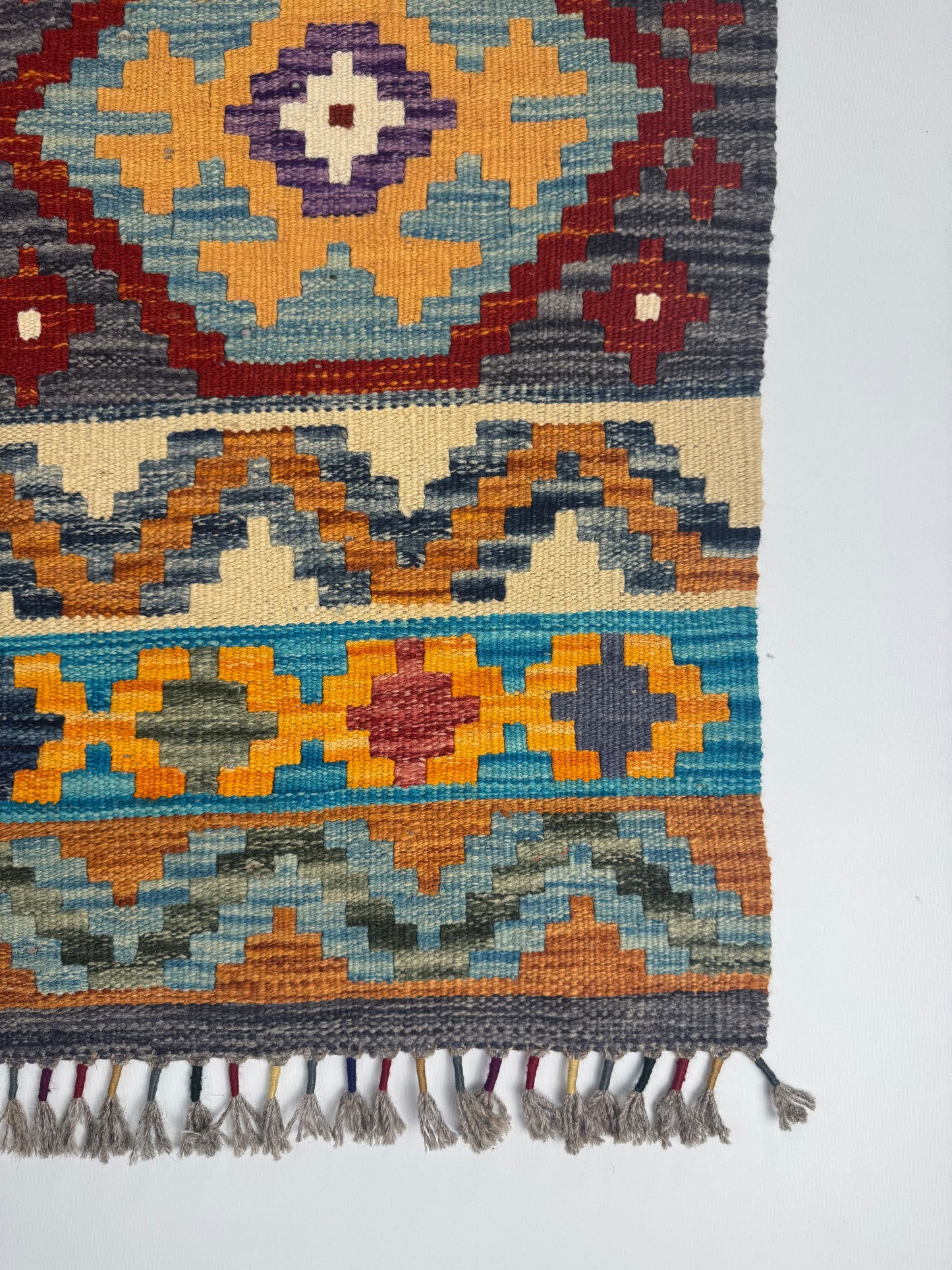 Nomad Glow El Dokuma Kilim – Turuncu Zeminli Çok Renkli Elmas Desenli Otantik Kilim (1.28 x 2.02 m) | NG-0030