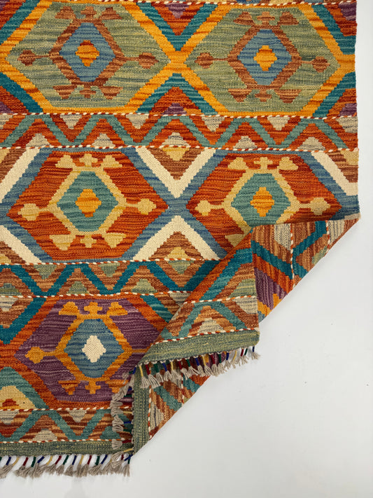 Nomad Glow El Dokuma Kilim – Çok Renkli Elmas ve Geometrik Desenli Otantik Kilim (1.22 x 1.81 m) | NG-0032