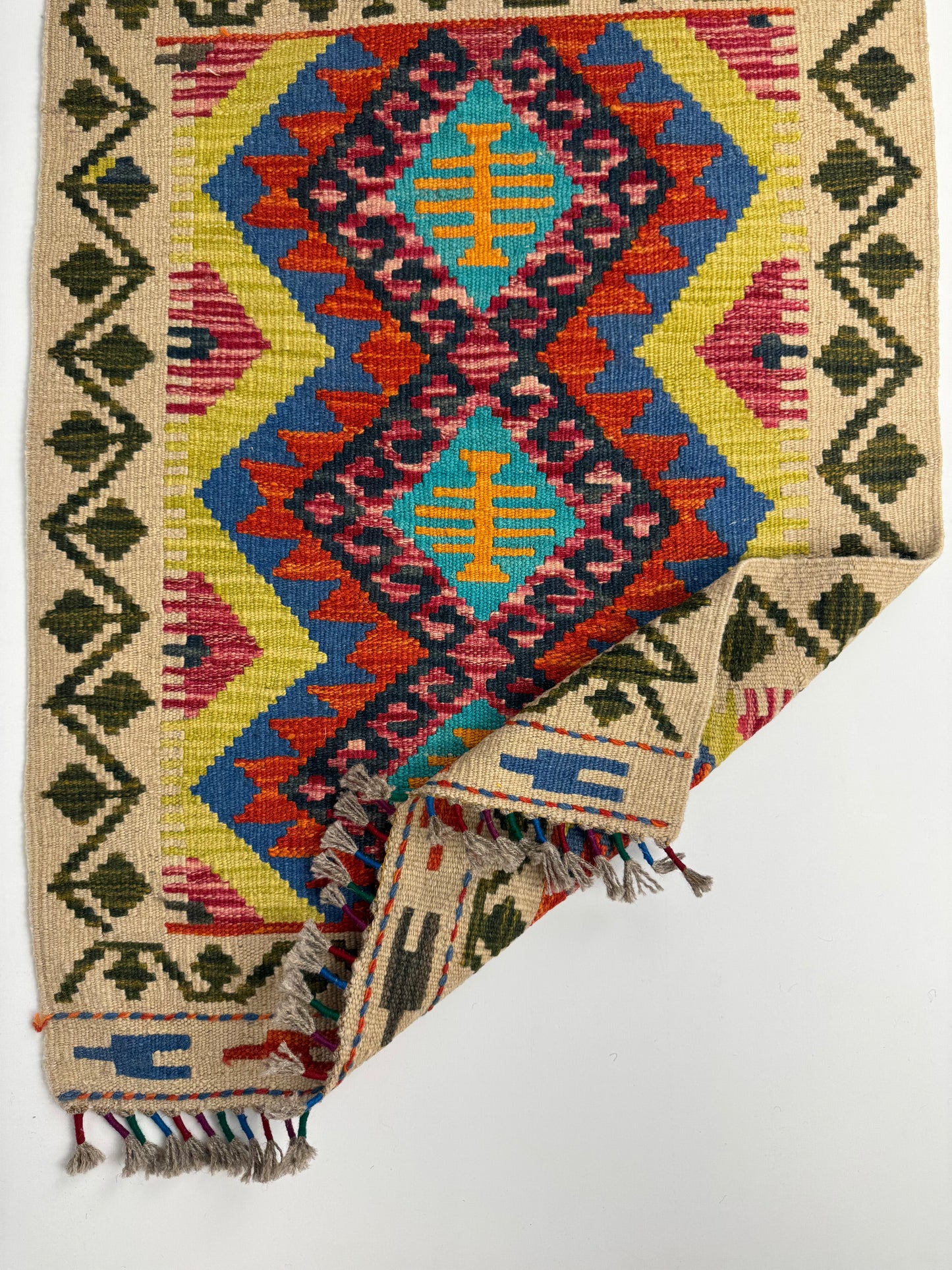 El Dokuma Renkli Küçük Kilim – Kırmızı Sarı Mavi Geometrik Desenli Otantik Halı (0.65 x 0.90 m) | Nomad Glow Serisi NG-0011