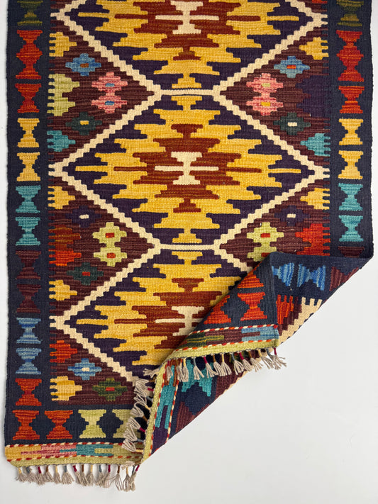 Nomad Glow El Dokuma Kilim – Sarı Kırmızı Lacivert Geometrik Desenli Otantik Kilim (0.78 x 1.22 m) | NG-0018